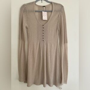 Free People beige sweater.  Versatile, can be worn as a sweater or a dress